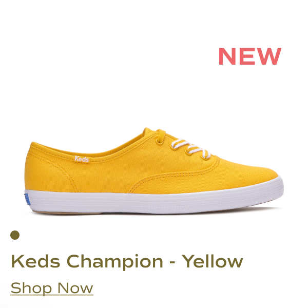 The Keds Champion Originals canvas lace up shoe in yellow. Shop Now.