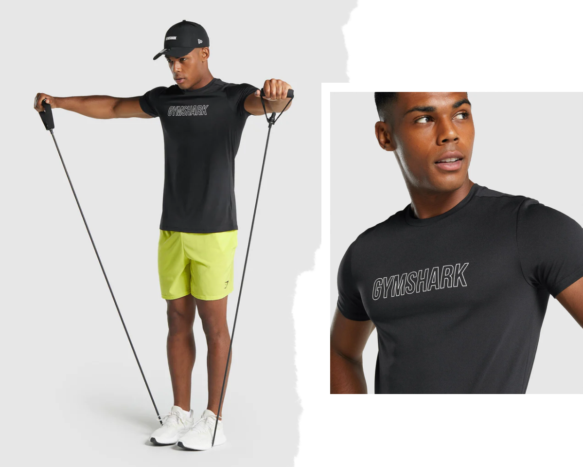 Model shows how to wear the Arrival Graphic T-shirt in Black. 