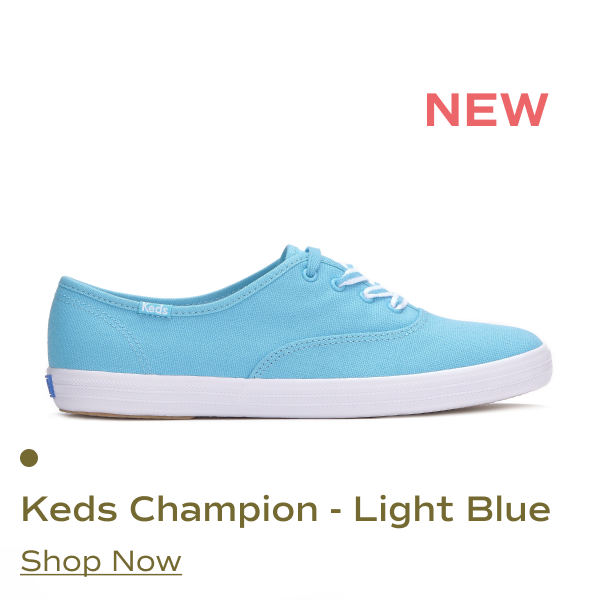 The Keds Champion Originals canvas lace up shoe in light blue. Shop Now.